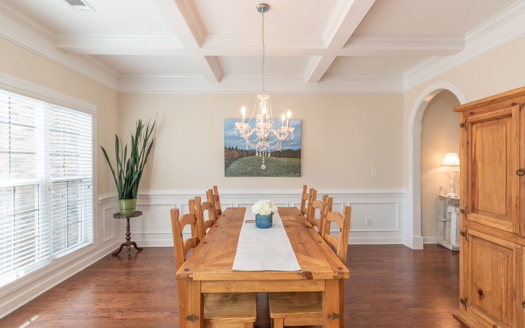 A beautifully staged dining room with natural light, showcasing clean and well-maintained spaces, highlighting the importance of home presentation when preparing to sell your home in Markham.